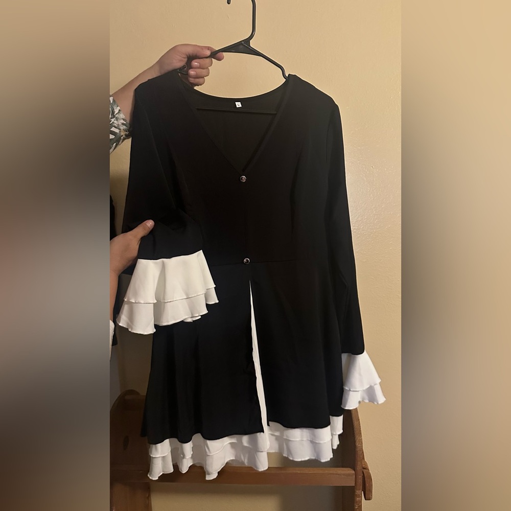 Black Dress with White Ruffle Accents